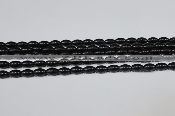 CAG6024 15.5 inches 6*9mm rice matte black agate beads