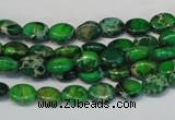 CDE178 15.5 inches 6*8mm oval dyed sea sediment jasper beads