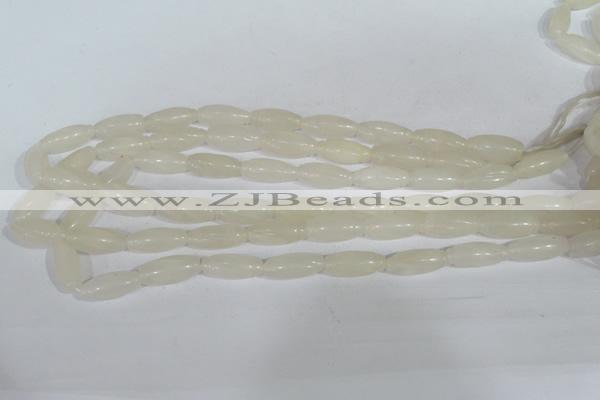 CFG551 15.5 inches 8*20mm carved rice white jade beads