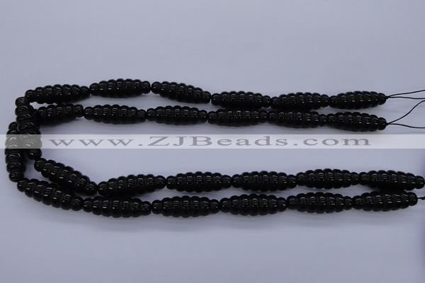 CFG760 15.5 inches 10*30mm carved rice black agate beads