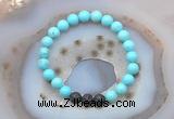 CGB6408 8mm round blue howlite & black lava beaded bracelets