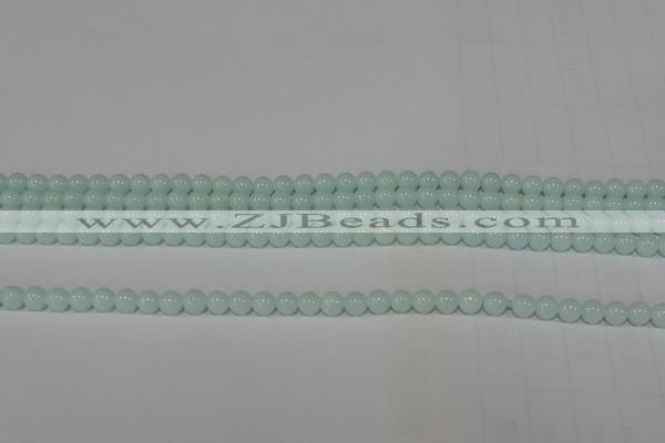 CTU2563 15.5 inches 4mm round synthetic turquoise beads