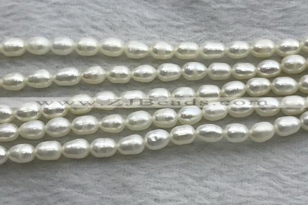 FWP167 14.5 inches 4mm - 5mm rice white freshwater pearl strands